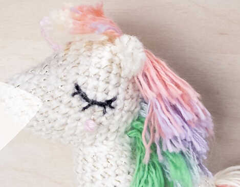 Detailed view of crochet ears for the amigurumi unicorn, showing the precise stitches of this Quick to Make Amigurumi fantasy toy.