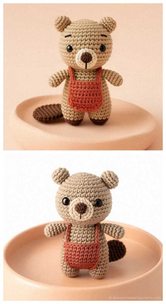 Small beige amigurumi beaver wearing red overalls on a neutral display plate