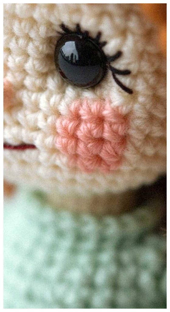 cute amigurumi doll crochet face detail with blush handmade doll toy