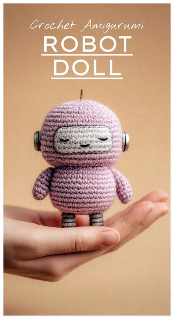 cute robot doll amigurumi small crochet toy sitting in hand kawaii handmade robot crochet design