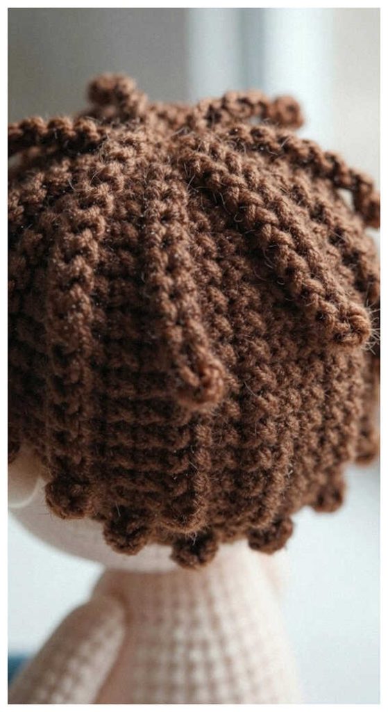 amigurumi doll crochet hair detail handmade soft yarn doll back view