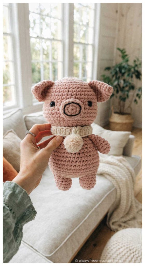 Cute pig amigurumi crochet doll with pom pom collar, handmade pig plush toy idea