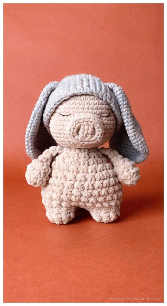 Soft pig amigurumi wearing bunny hood, cute handmade crochet pig plush toy idea