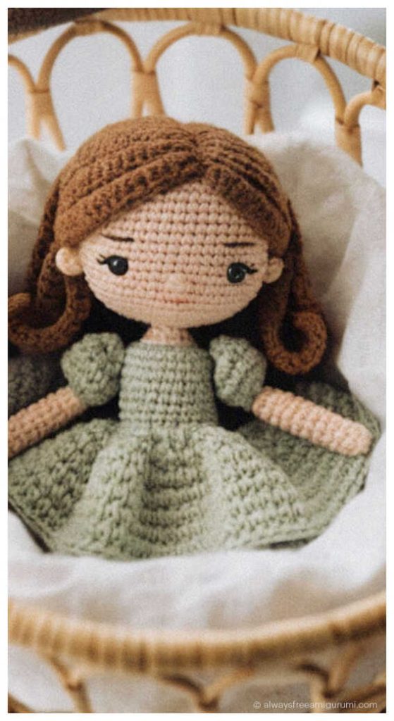 cute amigurumi doll crochet doll handmade toy sitting in basket