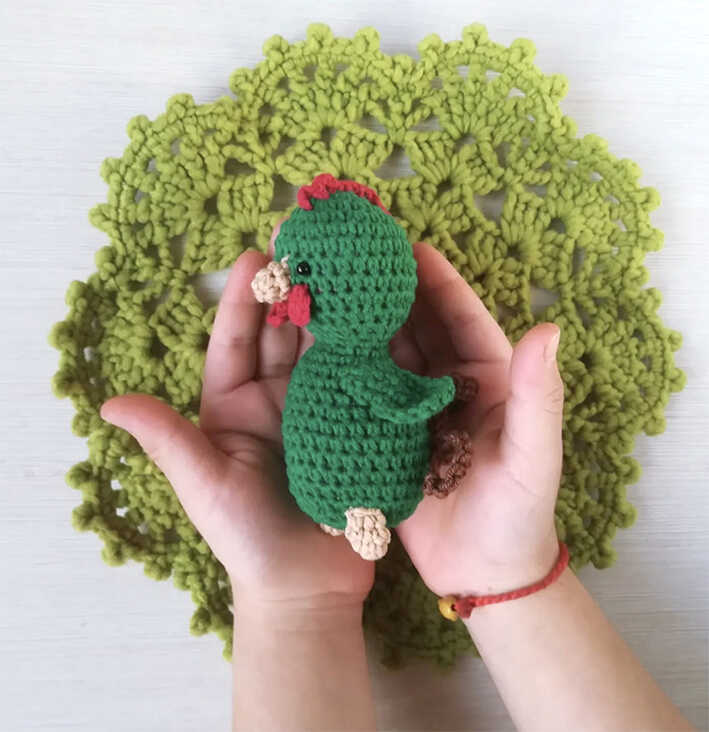 cute rooster amigurumi free crochet pattern small handmade toy in hands